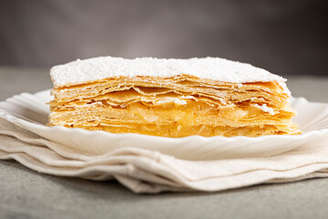 Mille feuille dessert on the plate.