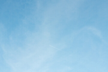 blue sky with jet stream