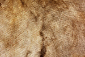 Old fabric with brown stains full frame for background, murder case idea, old blood stains on fabric,cream brown abstract