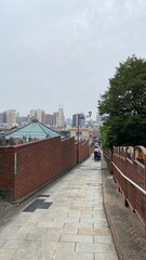 The street of Tokyo, once was famous for viewing Mt. Fuji from this top of hill, now the modern architectures fill the sky and unable to see the Fuji. Remains of local’s known slope “Fujimi-zaka”.  20
