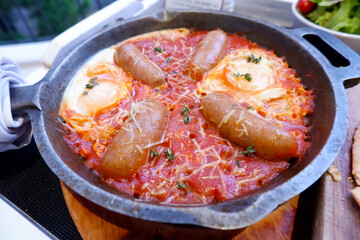 Sausage in a hot pan.