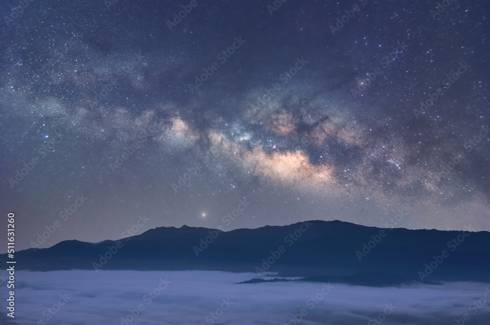 Wall mural milky way galaxy with stars and space dust in the universe, long speed exposure, night landscape wit