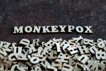 monkeypox word made from wood