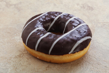 Glazed sweet tasty chocolate donut