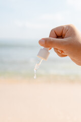 Droplet skin care on beach