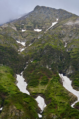 Mountain peaks and snow in the summer