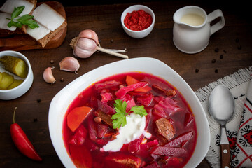 Ukrainian borscht with some accompanying appetizers