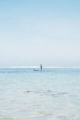 Naklejka premium Man going fishing on a small boat in Bali