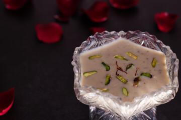 HEALTHY RABDI IN SERVING BOWL IN DARK BACKGROUND