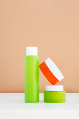 Mock up colourful cosmetic bottle and jar. Collection of skincare, moisturizer or spa products.