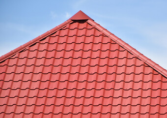 Roof of a house against sky