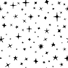Seamless pattern of hand drawn stars of different sizes and shapes, black and white
