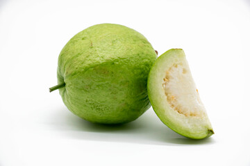 Whole and slices Guava isolated on the white background.