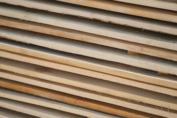 Wooden boards lie on top of each other as a background