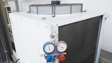 Maintenance and refill the refrigerant for out door unit HVAC.