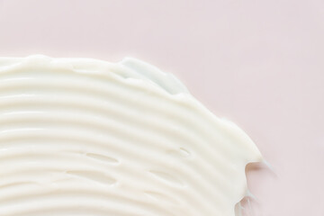 White cosmetic cream texture background. Fluid, cleanser, emulsion. Creamyy skincare product closeup