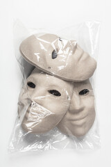 papier mache masks on a white background - 511667812
