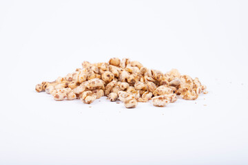 Puffed wheat cereal in a yellow bowl on white background, honey air rice isolated with clipping path