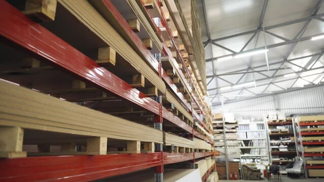 Top down view of warehouse racks with slabs for making furniture. Furniture industry.