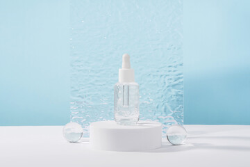 Serum cosmetic bottle with peptides and retinol on pedestal with ribbed plate on blue background....