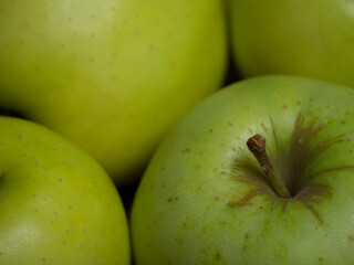 Renet simirenko green apples, top view, close-up. Macro shot of fruit.