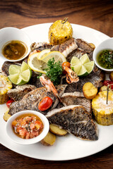 mixed fried fish plate with seared seabass and red snapper