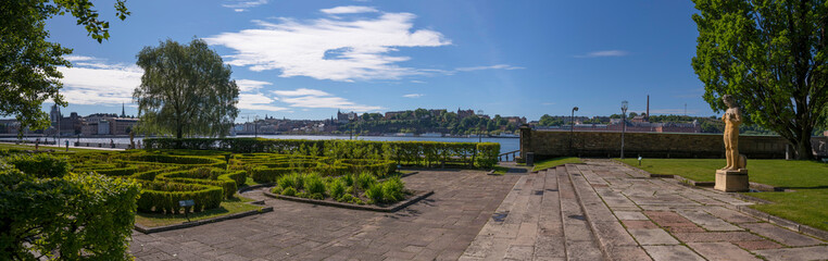 Fototapeta premium The Town City Hall building and the parterre en broderie a sunny summer day in Stockholm