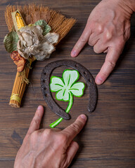 Superstitious gestures and lucky objects in the Italian tradition, such as horns, four-leaf clover...