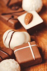 Home made chocolate candies close up. Vertical photography.