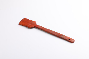 wooden spoon on white background.