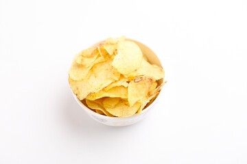 potato chips in bowl on white background.