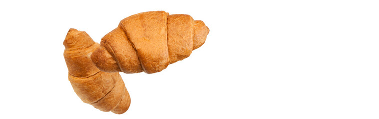 Croissants brioche bun flies in the air. Freshly baked puff pastry cookies fall on white. Delicious French baked croissants with almonds. Levitation, bakery cafe concept