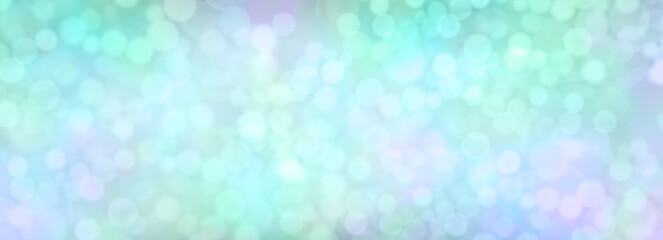 Pale lime green and lilac bokeh background - soft pastel coloured banner ideal for new baby, birthday and other special occasion celebrations themes
