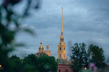 A view on Peter and Paul fortress with it s golden peaks on a cold cloudy day