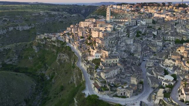 View from above, stunning aerial view of the Matera&rsquo;s skyline during a beautiful sunrise. Matera is a city on a rocky outcrop in the region of Basilicata, in southern Italy.
