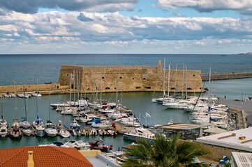Heraklion Fort and old Venetian harbour on a cloudy morning shot from above