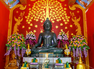 Green jade buddha in the church Wat Phra That In Khang, Phrae Province, Thailand