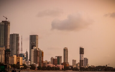 city life of mumbai in its rich infrastructure , construction of new building for future.