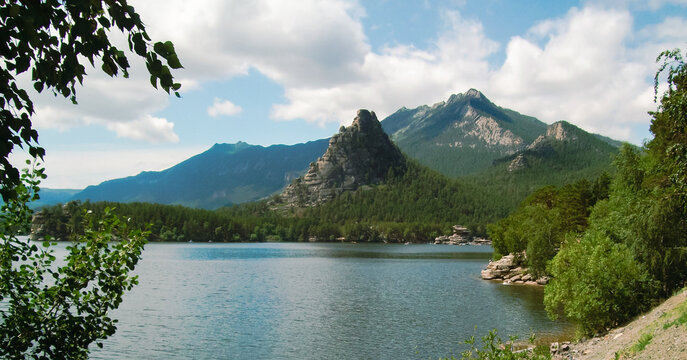 Lake Burabay, Mount Okzhetpes and forest against the backdrop of Mount Kokshetau and forest in Burabay National Park in Kazakhstan