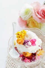 Fototapeta na wymiar Multiple color popcorn on vanilla ice-cream