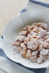 Chinese cooking, corn starch mixed with Chicken soft bone prepared for deep frying