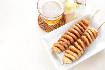 Korean street food, fried potato with spicy salt