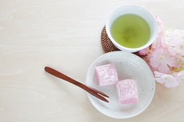 Japanese Cherry blossom color Mochi confectionery and green tea