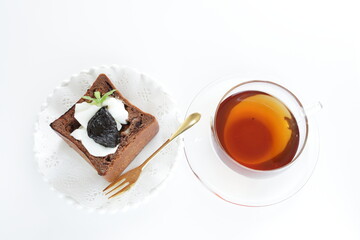 Dried plum and yogurt in chocolate bread and English black tea