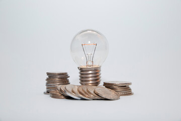 light bulb and coins