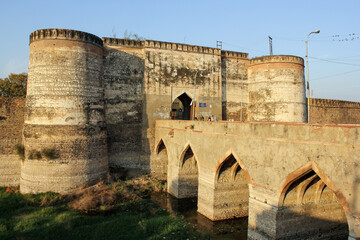 The ancient Lohagarh fort with the bridge across the river moat in the town of Bharatpur.