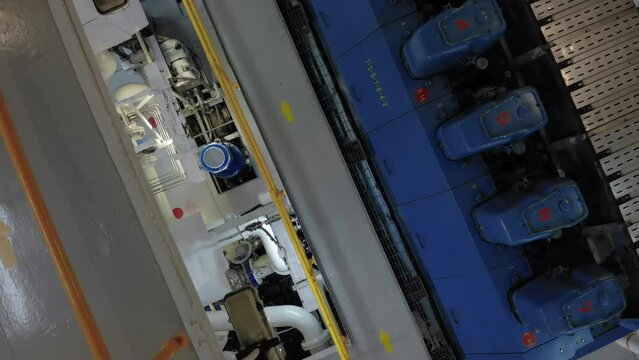 Top of main engine in engine room of ship