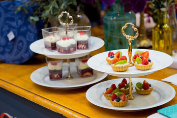 Glass shots pastry, wedding catering food, mini canapes food, tasty dessert, Beautiful decorate catering banquet table,  snacks and appetizers, wedding celebration
