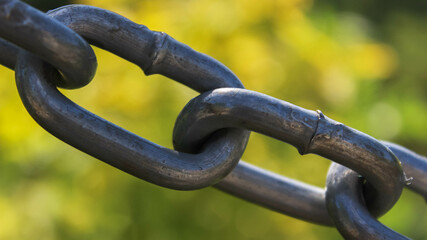 Chain links up close with blurred background