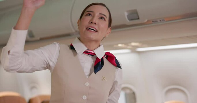 Working as a cabin crew member or an air hostess in an airplane